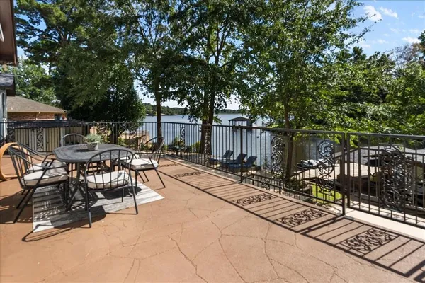 a view of a chairs and tables in the patio