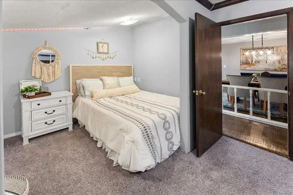 a bedroom with a bed and a cabinets