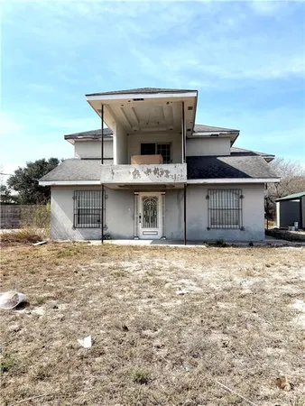 a view of a house with a garage