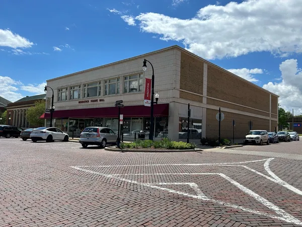 a view of a building and a street