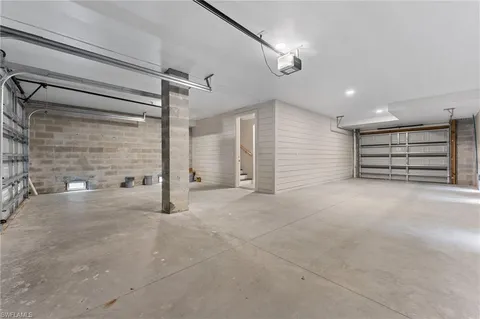 a view of an empty room with a walk in closet