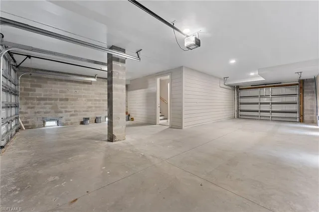a view of an empty room with a walk in closet