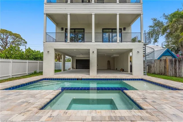 a view of an house with backyard floor and kitchen view