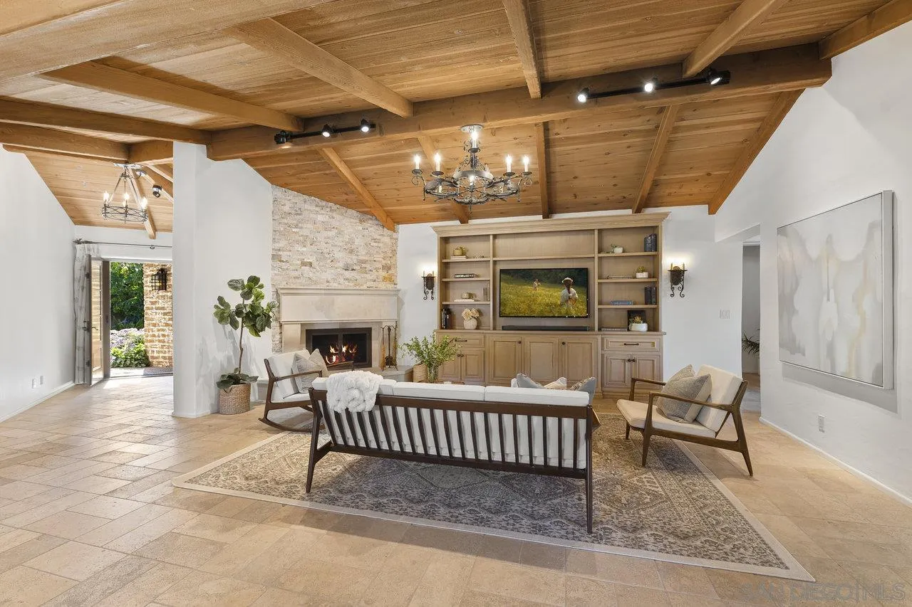 6101 Camino Selva Rancho Santa Fe, CA 92067 - Photo 12 of 35 a balcony with furniture and a fireplace