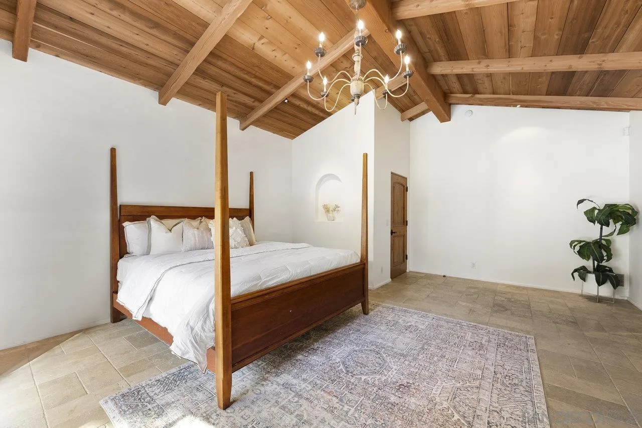 6101 Camino Selva Rancho Santa Fe, CA 92067 - Photo 20 of 35 a bed room with a bed and a chair