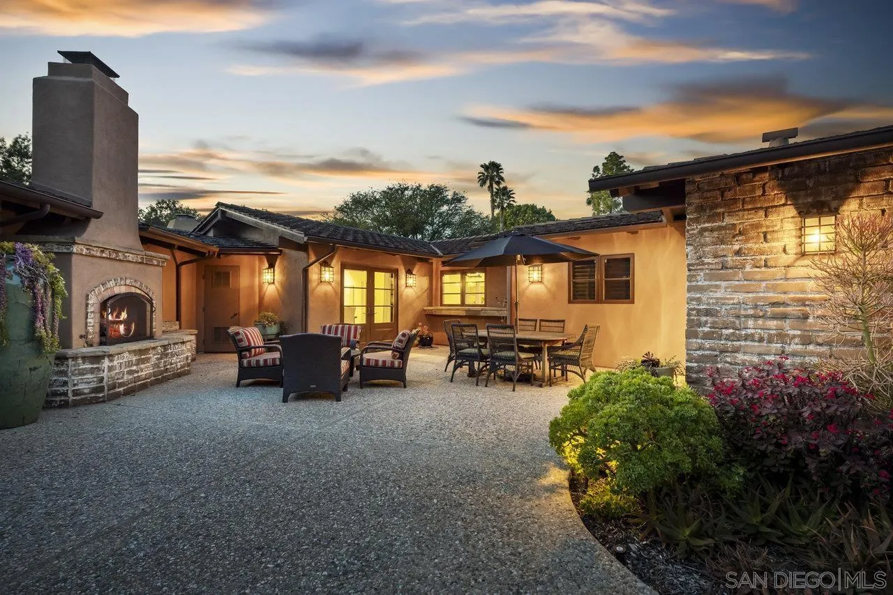 6101 Camino Selva Rancho Santa Fe, CA 92067 - Photo 4 of 35 a view of a couch and table in the back yard of a building