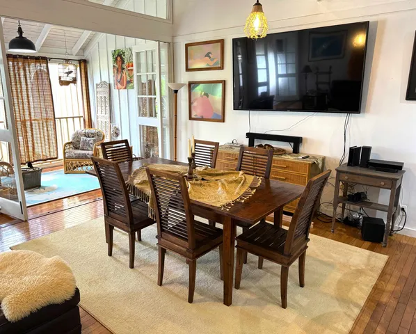 a view of a dining room with furniture