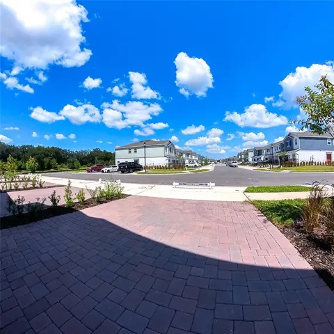 a view of kitchen with wooden floor