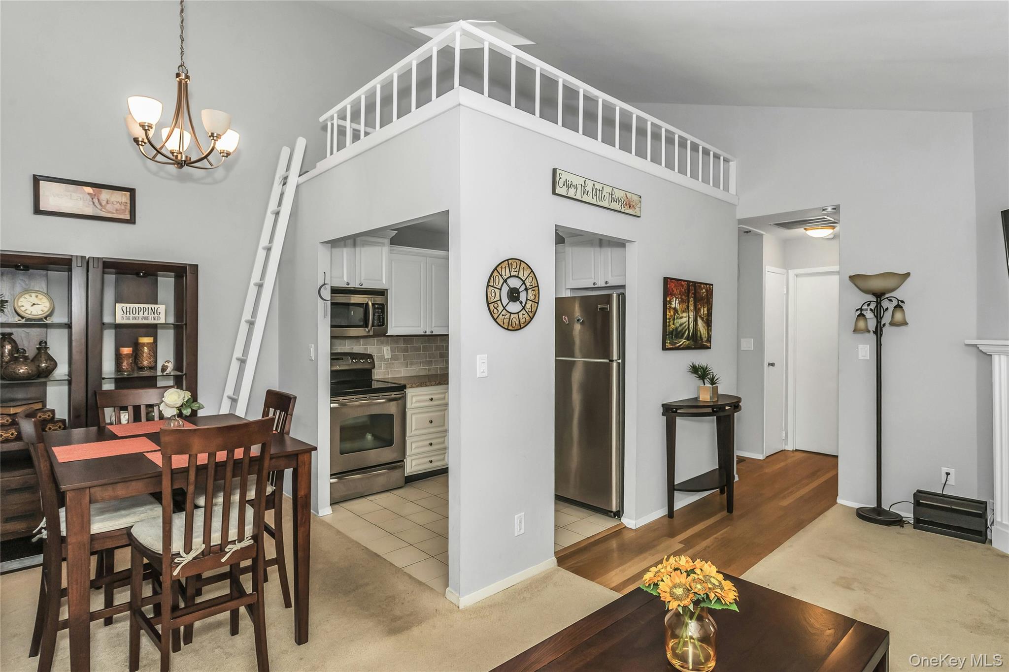 650 Newbridge Road, Unit 9 East Meadow, NY 11554 - Photo 3 of 9 a very nice looking dining room with a table and chairs