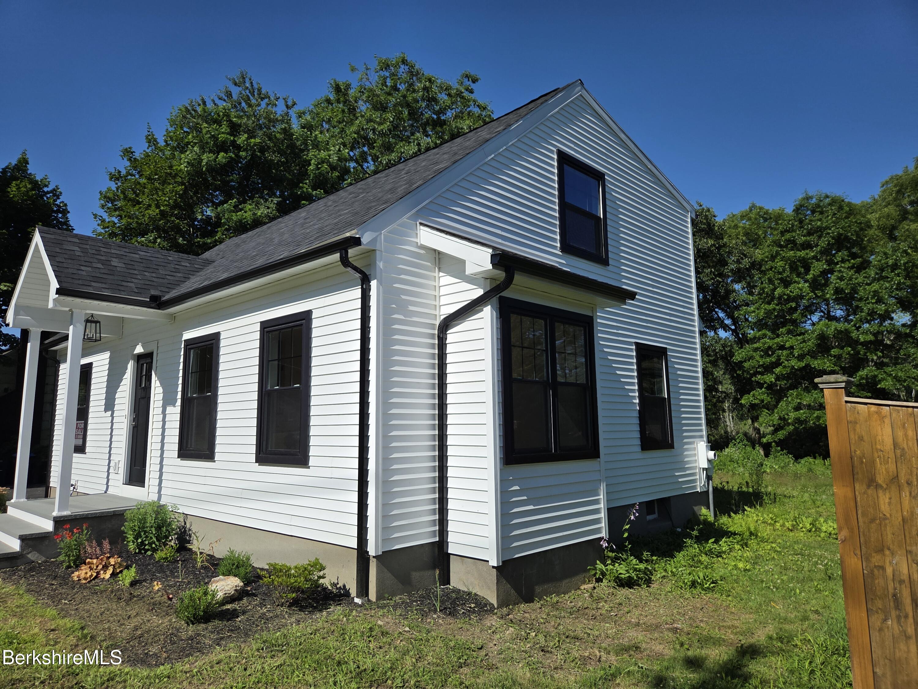 747 Pecks Road Pittsfield, MA 01201 - Photo 3 of 39 Side view