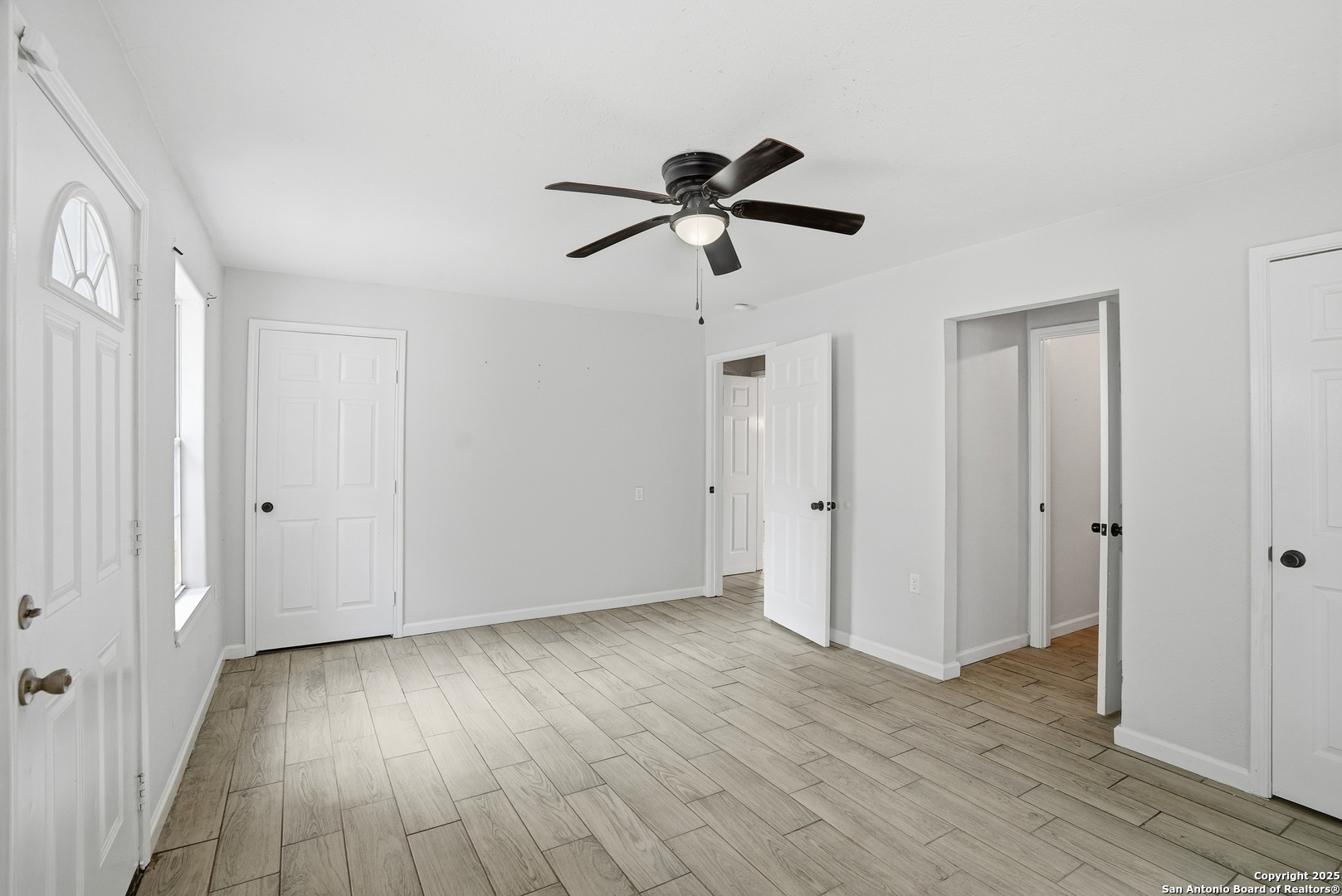 807 Northeast Frontage Road Beeville, TX 78102 - Photo 17 of 49 a view of empty room with wooden floor
