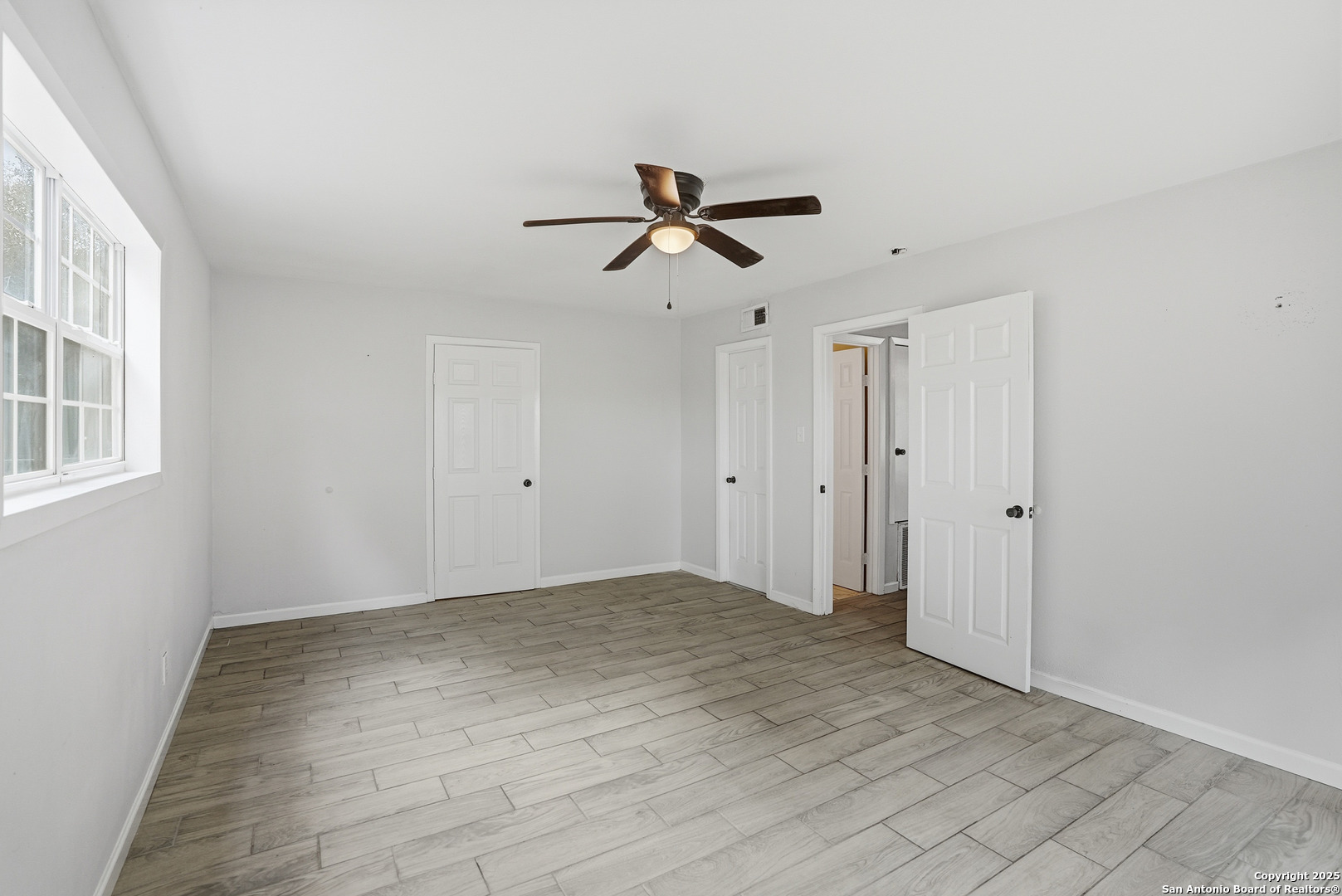 807 Northeast Frontage Road Beeville, TX 78102 - Photo 23 of 49 a view of a ceiling fan in a room