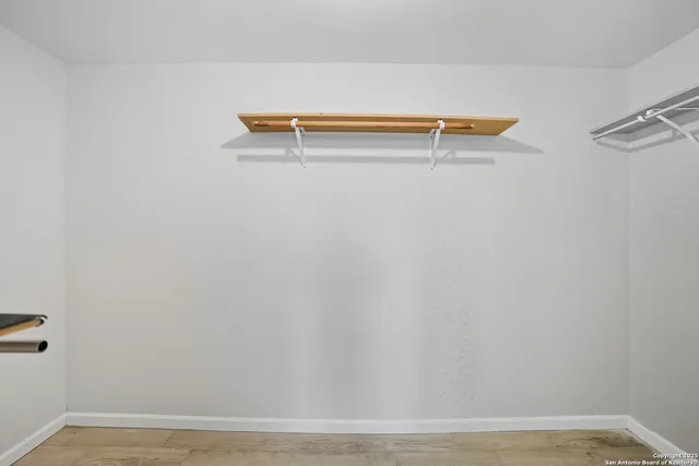 a view of small space with racks on the wall