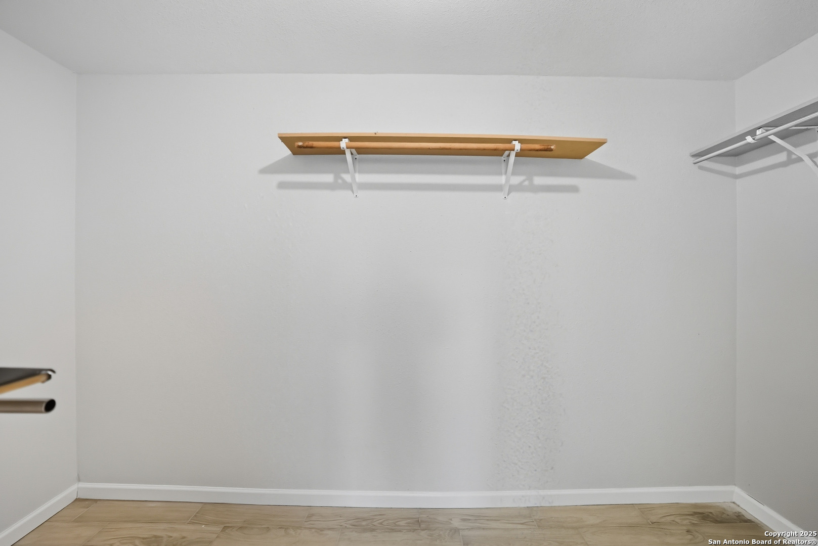 807 Northeast Frontage Road Beeville, TX 78102 - Photo 24 of 49 a view of small space with racks on the wall