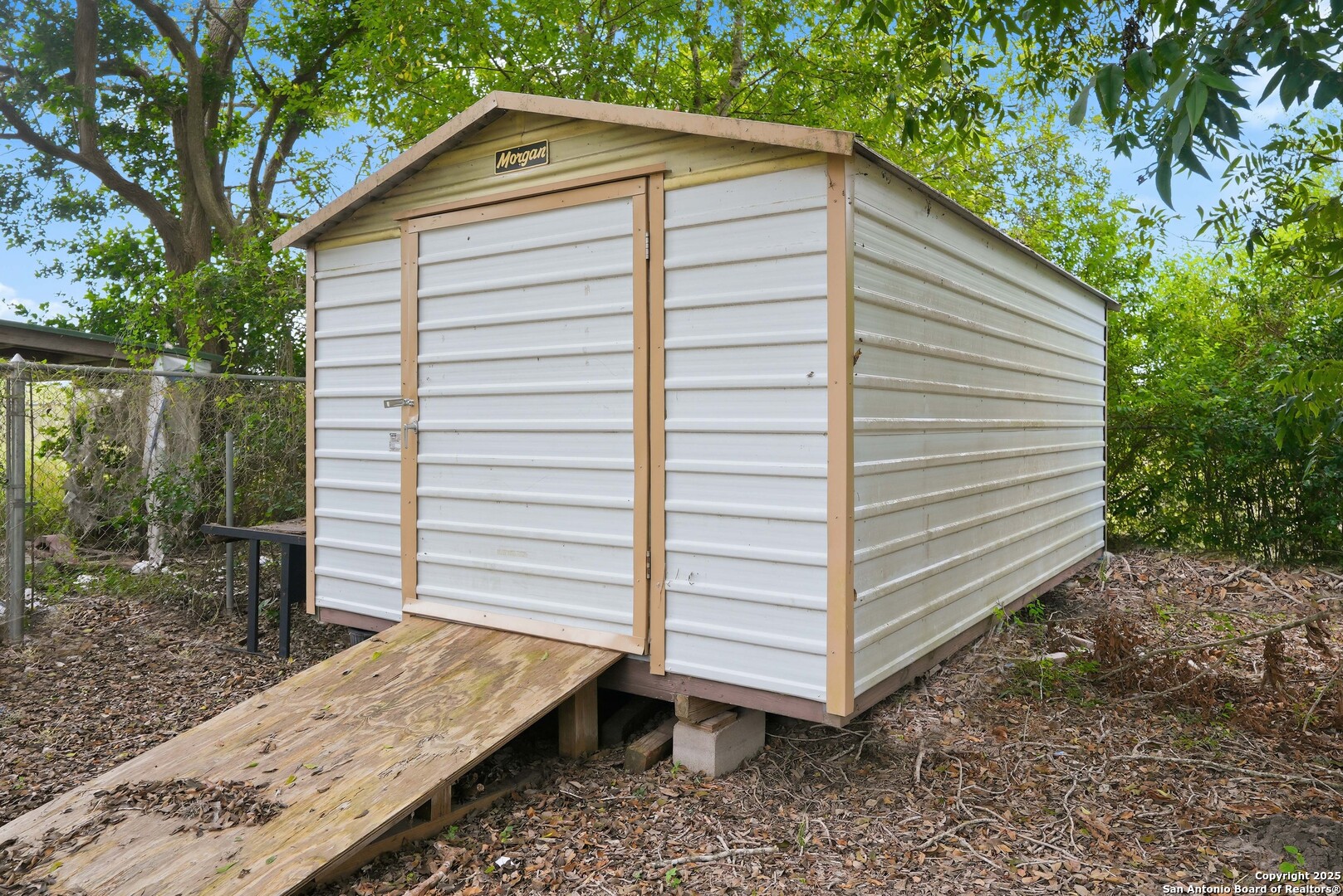 807 Northeast Frontage Road Beeville, TX 78102 - Photo 39 of 49 a view of a small house with backyard