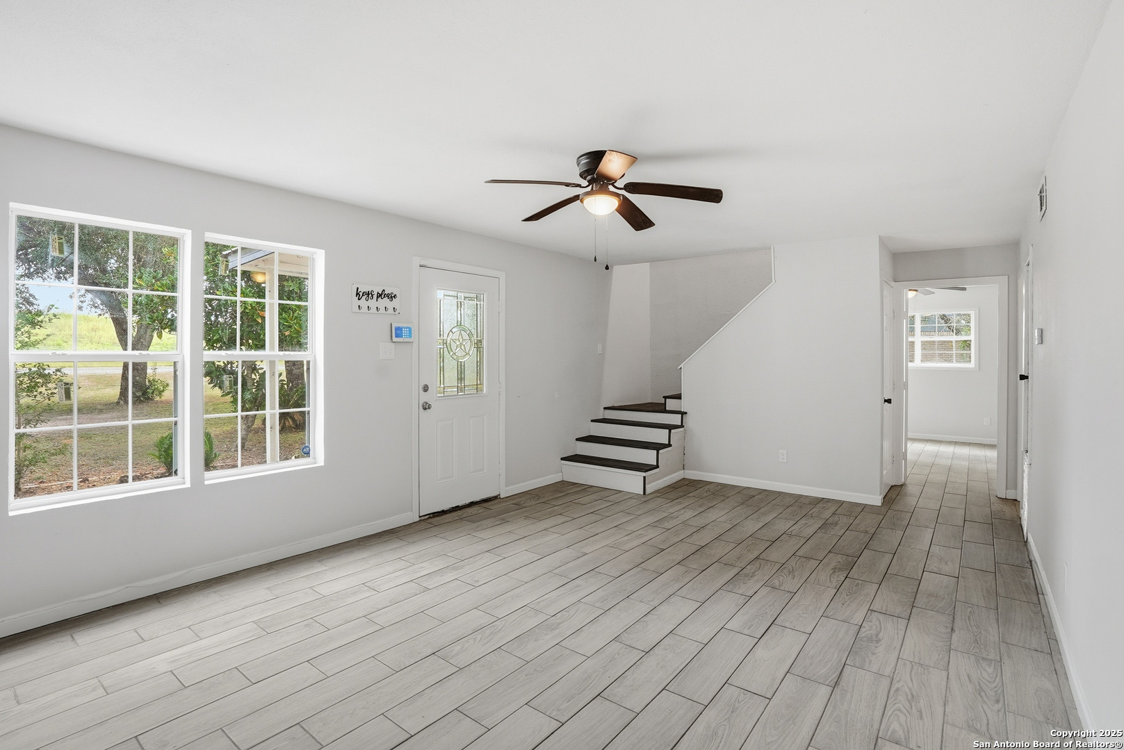 807 Northeast Frontage Road Beeville, TX 78102 - Photo 5 of 49 a view of an empty room with a window