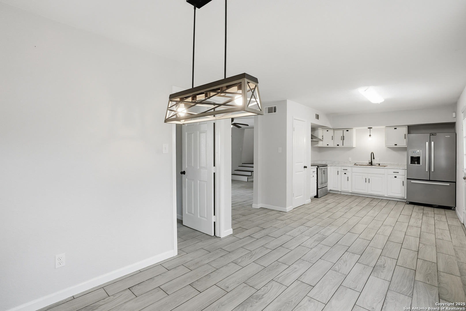 807 Northeast Frontage Road Beeville, TX 78102 - Photo 9 of 49 a view of a kitchen with refrigerator and window