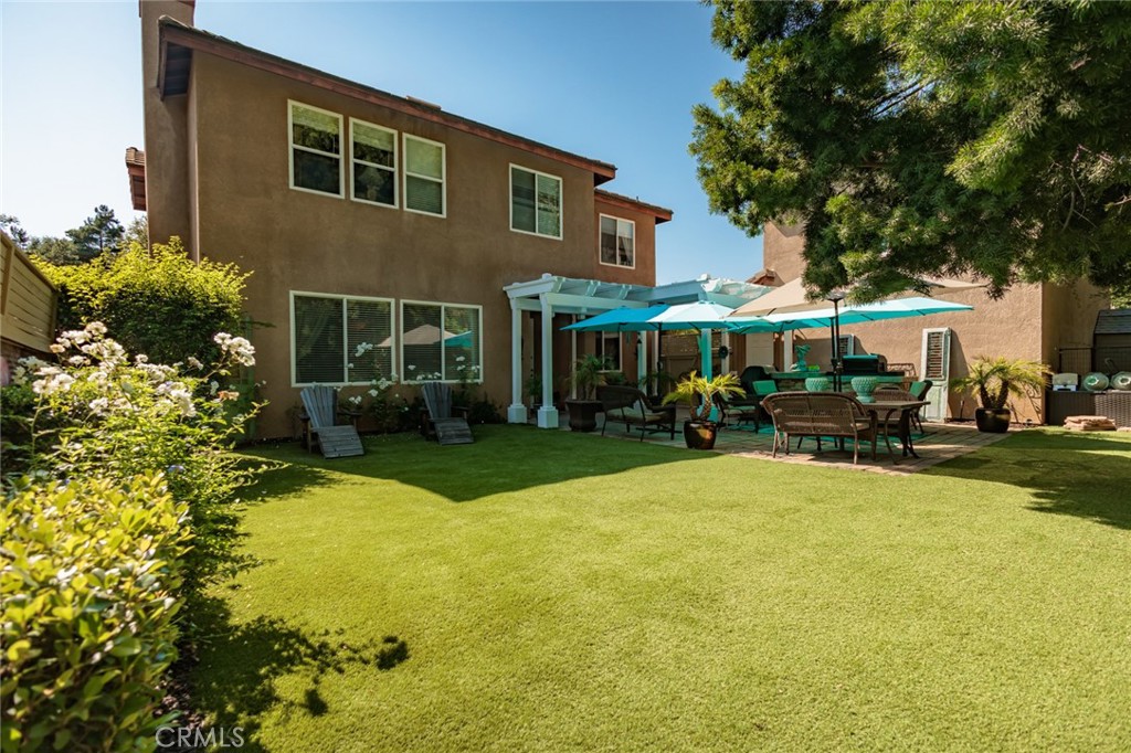 1045 Inverlochy Drive Fallbrook, CA 92028 - Photo 2 of 39 a view of a house with swimming pool and sitting area