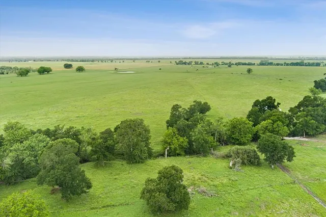 a view of an ocean and a yard