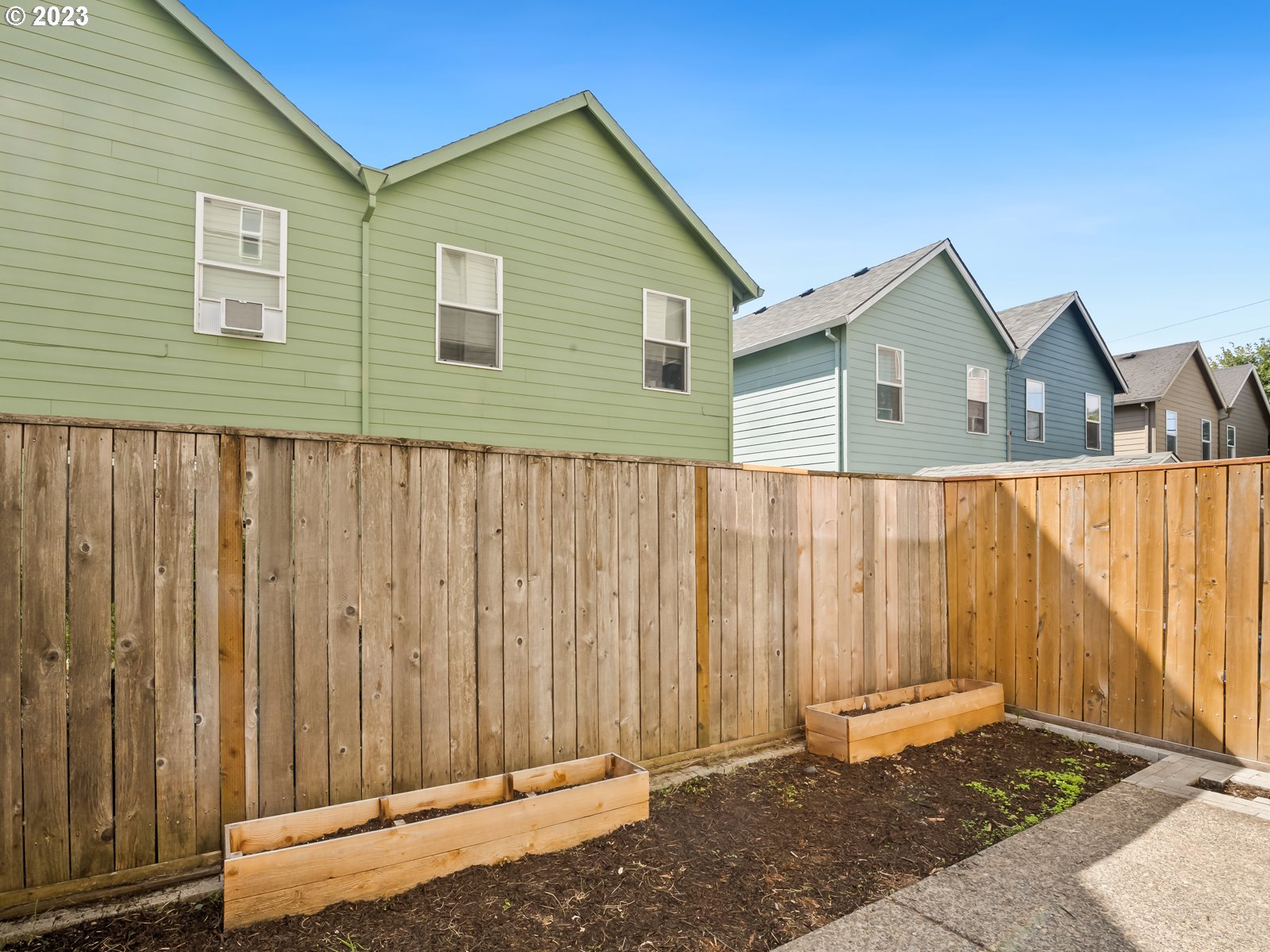 12226 Southeast Long Street Portland, OR 97236 - Photo 29 of 29 a view of a house with wooden fence