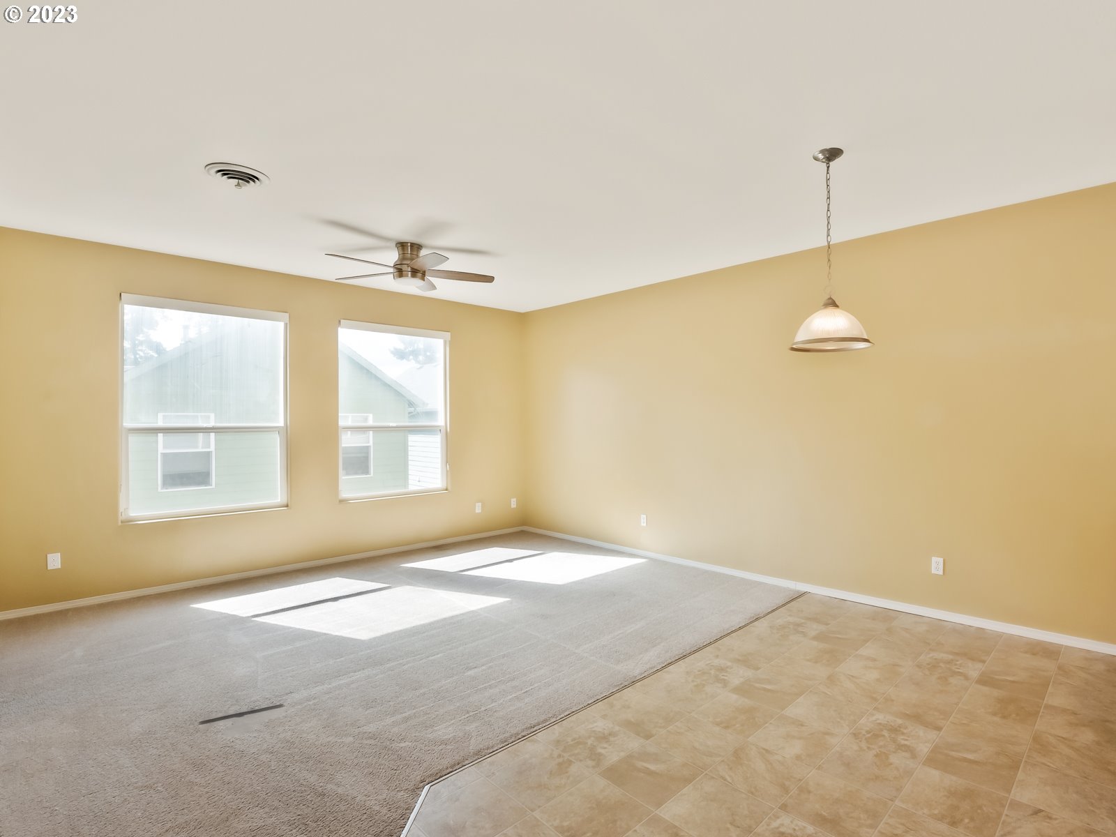 12226 Southeast Long Street Portland, OR 97236 - Photo 7 of 29 a view of an empty room with a window