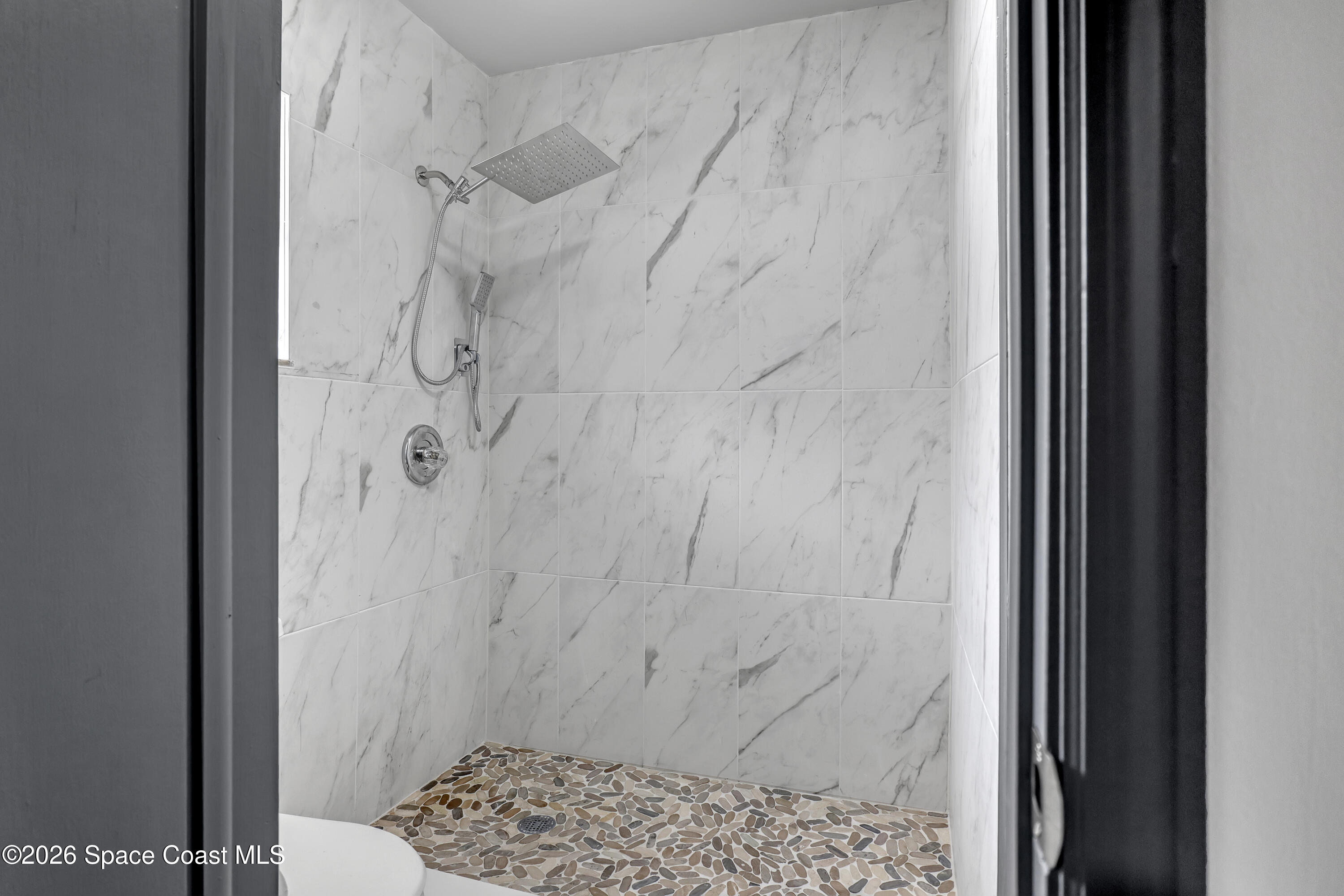 999 Castile Road Southeast Palm Bay, FL 32909 - Photo 23 of 45 Beautifully done bathroom shower