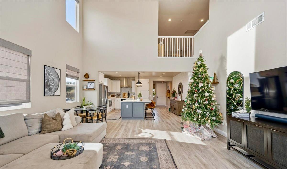 508 Chase Court Colfax, CA 95713 - Photo 11 of 34 a living room with furniture and a flat screen tv
