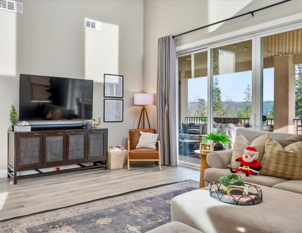 508 Chase Court Colfax, CA 95713 - Photo 13 of 34 a living room with furniture and a fireplace