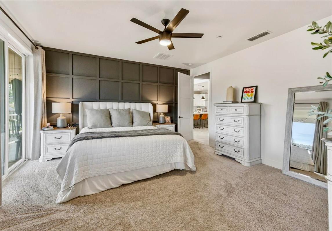 508 Chase Court Colfax, CA 95713 - Photo 15 of 34 a bedroom with a bed and a ceiling fan