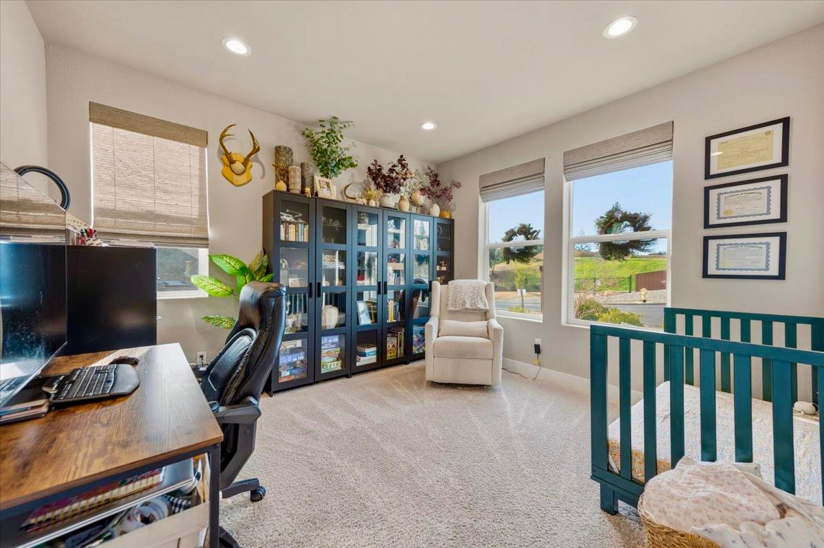 508 Chase Court Colfax, CA 95713 - Photo 20 of 34 a living room with furniture and a flat screen tv