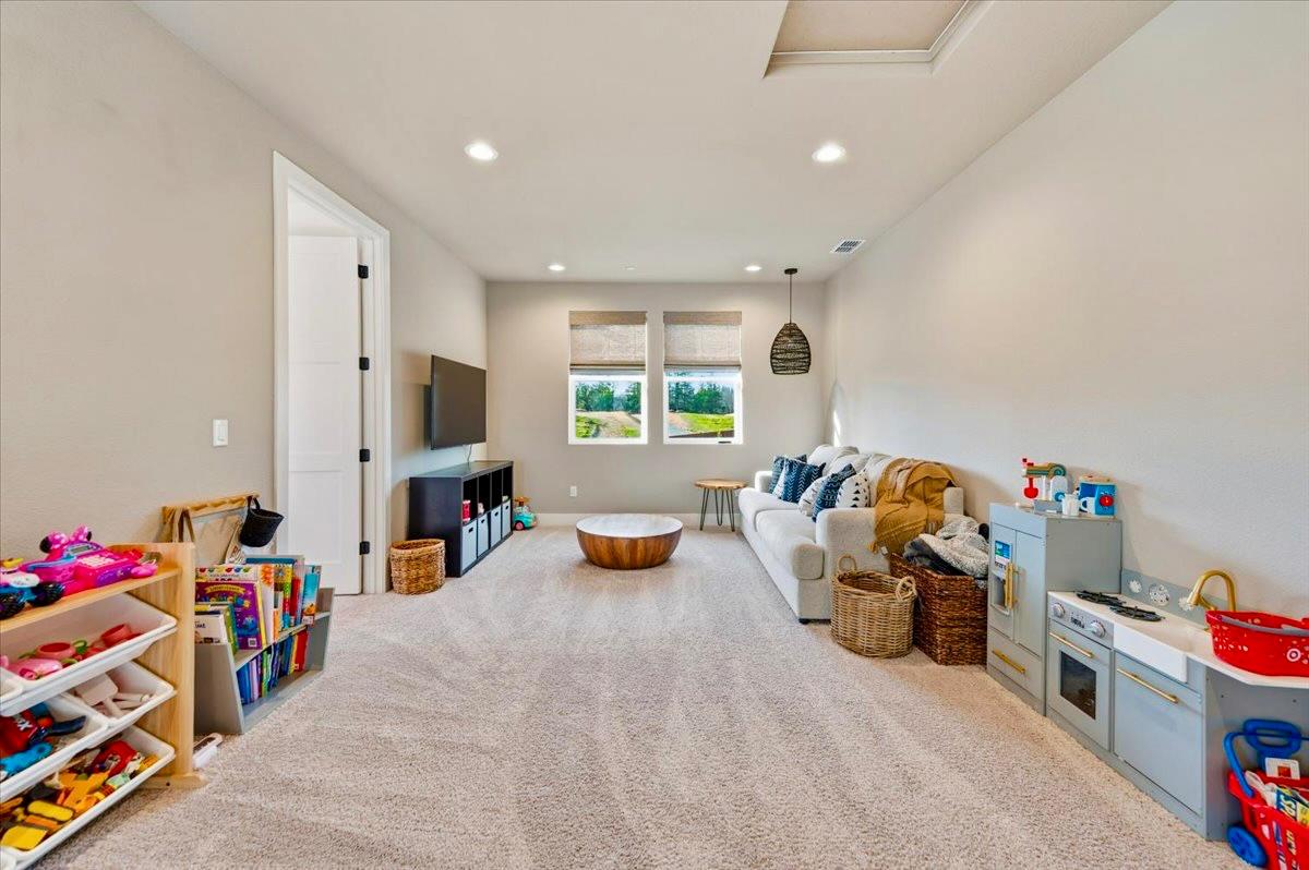 508 Chase Court Colfax, CA 95713 - Photo 22 of 34 a view of a room with toys and a couch