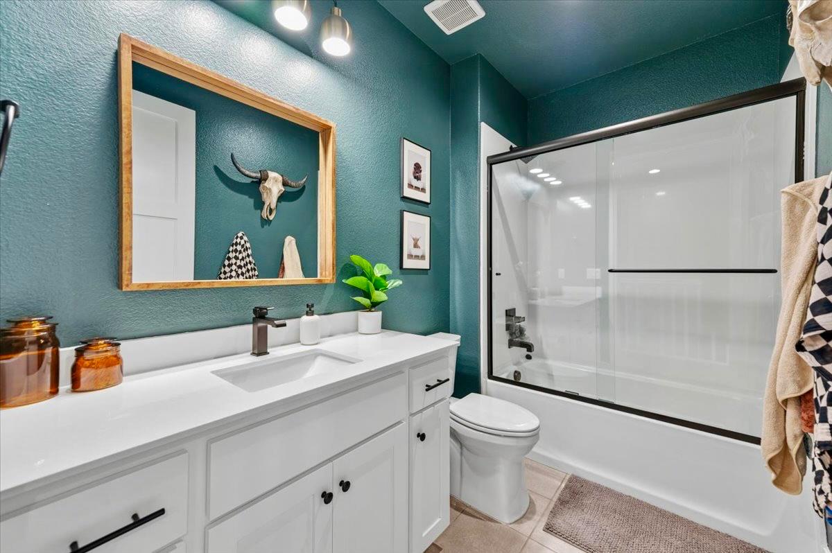 508 Chase Court Colfax, CA 95713 - Photo 5 of 34 a bathroom with a toilet sink and shower