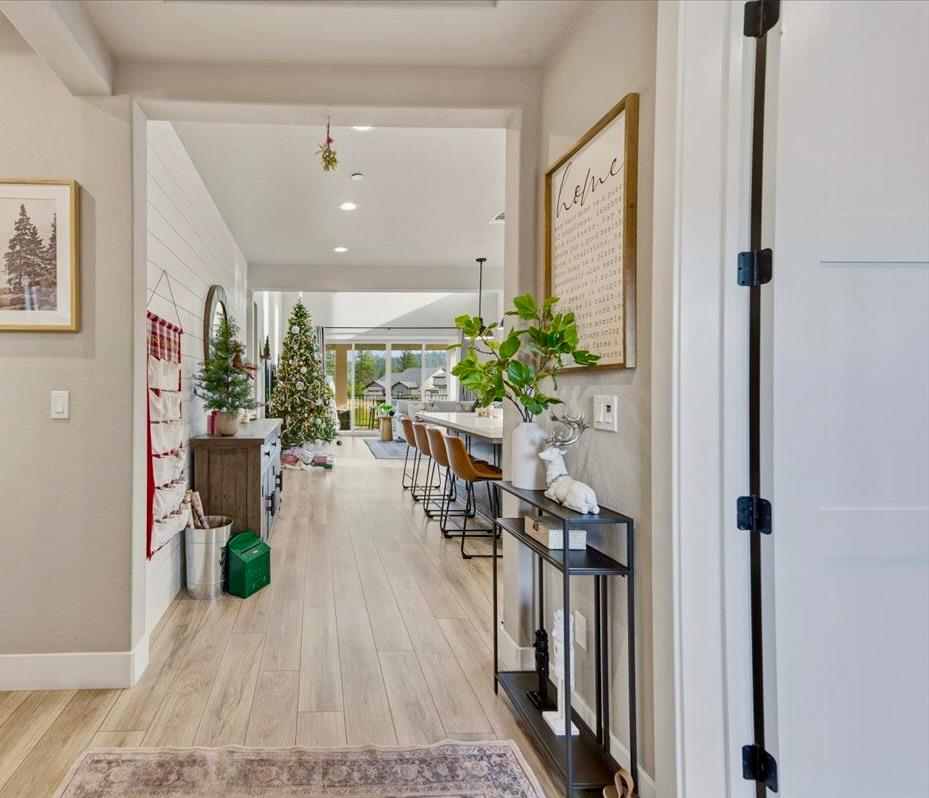 508 Chase Court Colfax, CA 95713 - Photo 7 of 34 a living room with furniture and a chandelier