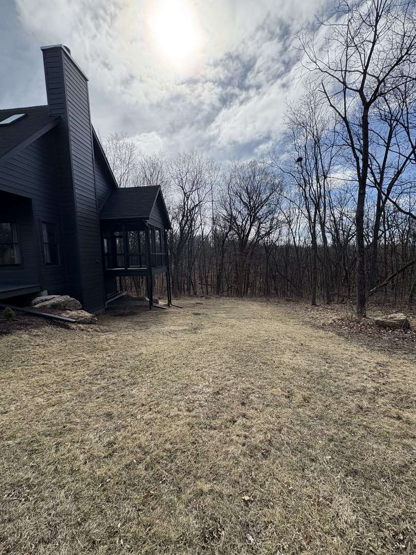 1124 North Clark Lane Elizabeth, IL 61028 - Photo 49 of 50 a view of backyard with wooden fence