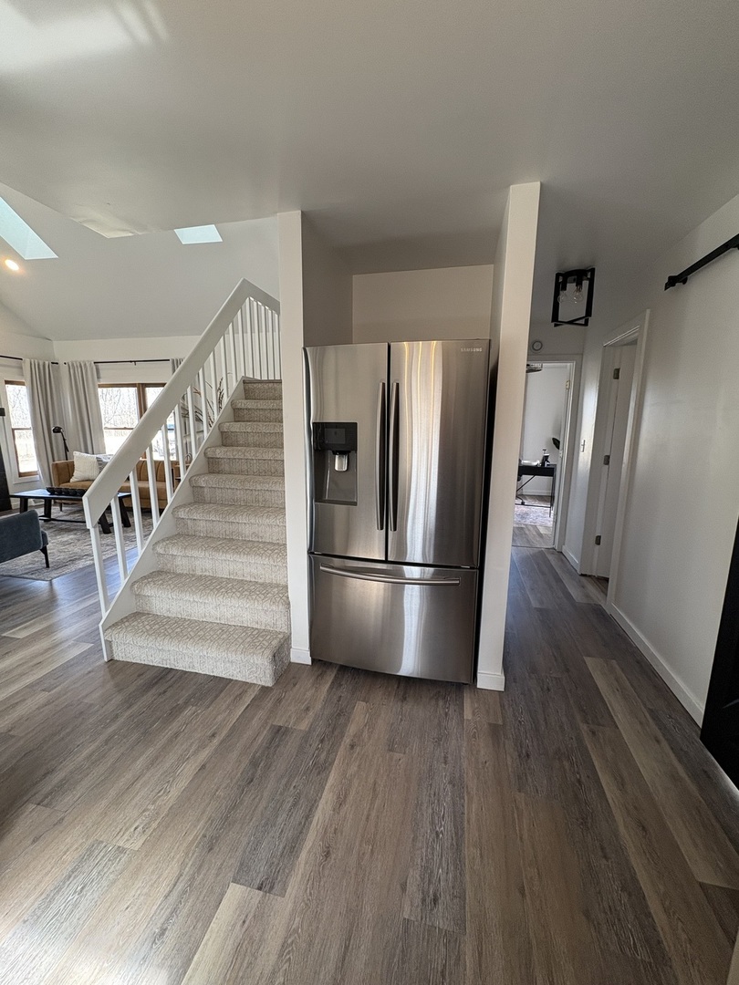 1124 North Clark Lane Elizabeth, IL 61028 - Photo 8 of 50 a kitchen with stainless steel appliances a refrigerator and wooden floor
