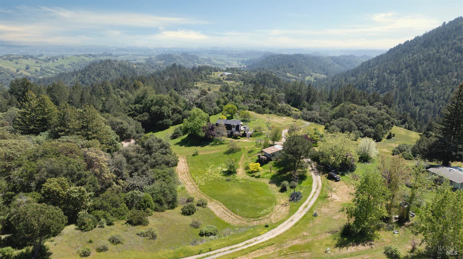 10957 Westside Road Healdsburg, CA 95448 - Photo 3 of 30 The land itself is a nature lover's dream, with established hiking trails that weave through forests and meadows.