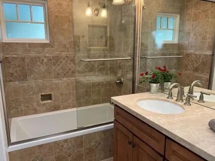 a bathroom with a sink and a mirror
