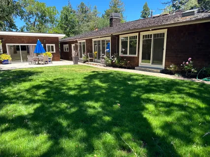 a front view of house with yard and porch