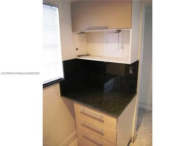 a utility room with a sink