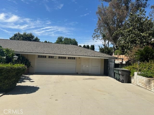 2145 Fairview Avenue Riverside, CA 92506 - Photo 5 of 35 a front view of a house with a yard