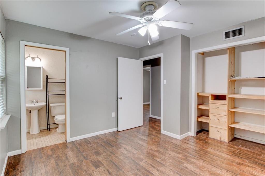 3558 Winston Road Fort Worth, TX 76109 - Photo 11 of 24 wooden floor in an empty room with a window