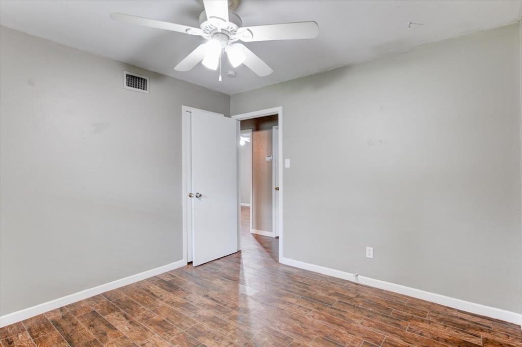 3558 Winston Road Fort Worth, TX 76109 - Photo 12 of 24 wooden floor in an empty room