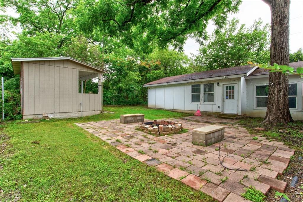 3558 Winston Road Fort Worth, TX 76109 - Photo 23 of 24 a front view of house with yard and trees around