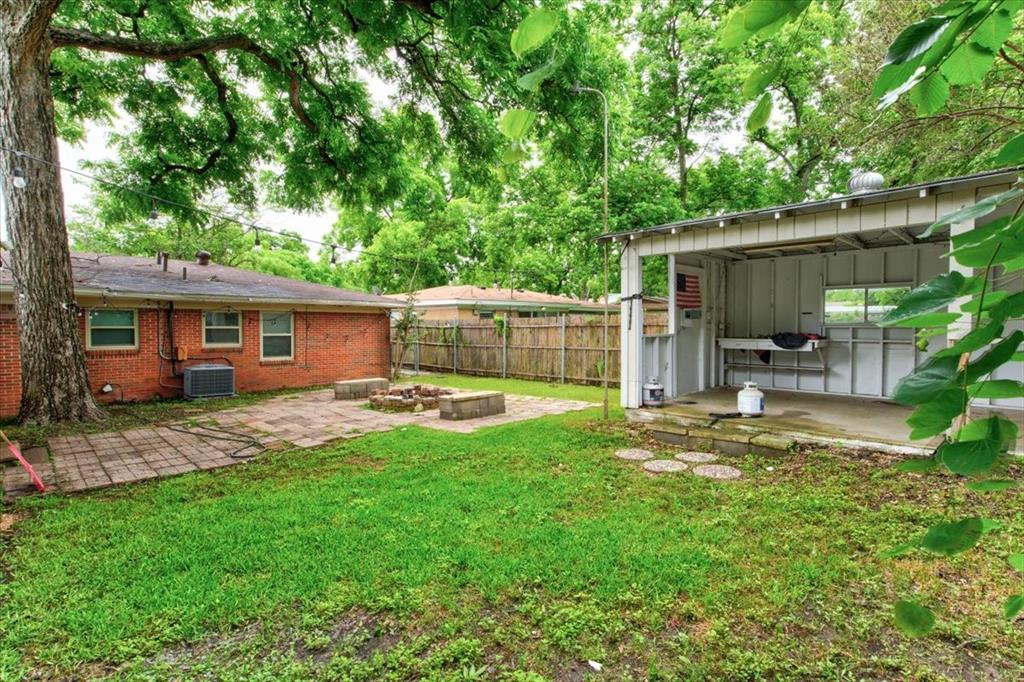 3558 Winston Road Fort Worth, TX 76109 - Photo 24 of 24 a view of a backyard with a barbeque grill and a large tree