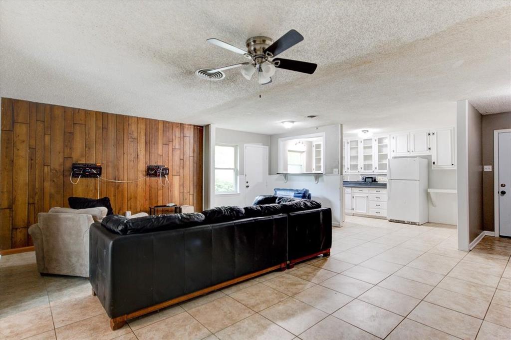 3558 Winston Road Fort Worth, TX 76109 - Photo 9 of 24 a living room with furniture and a window