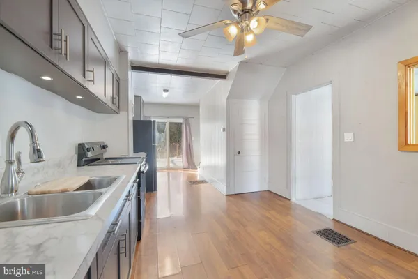 a view of livingroom with furniture and wooden floor