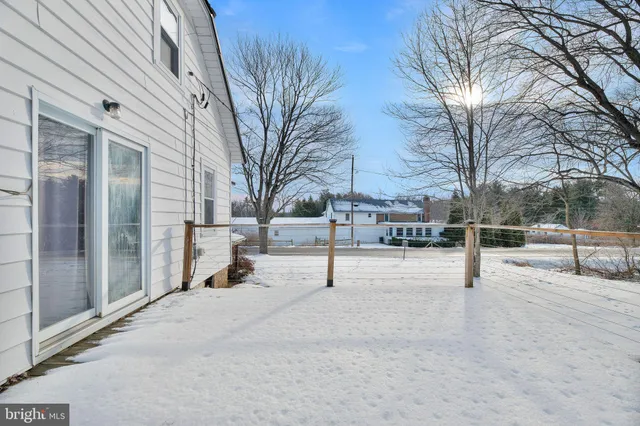 a view of hallway with natural light
