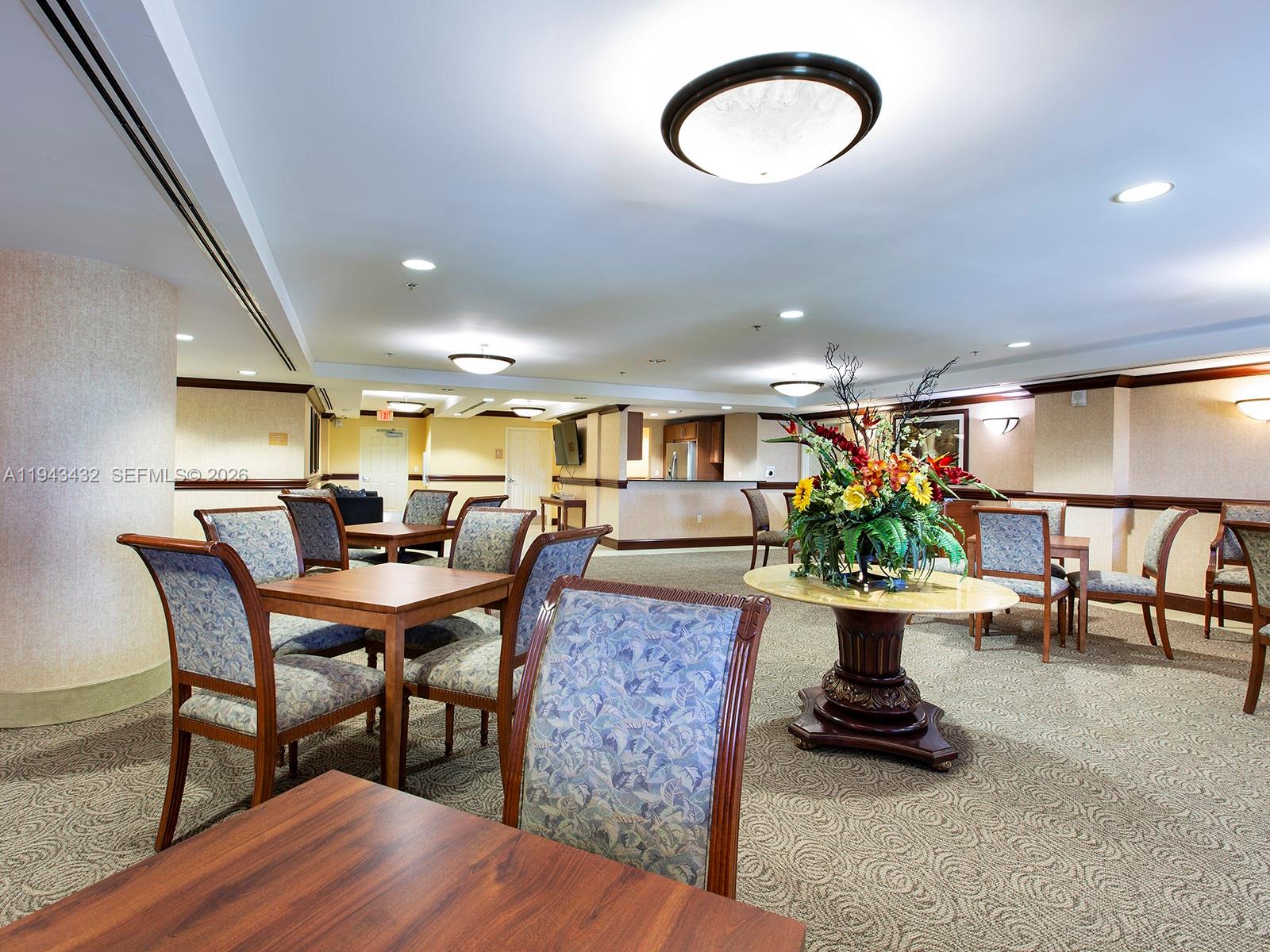8395 Southwest 73rd Avenue, Unit 528 Miami, FL 33143 - Photo 23 of 27 a view of a dining room with furniture