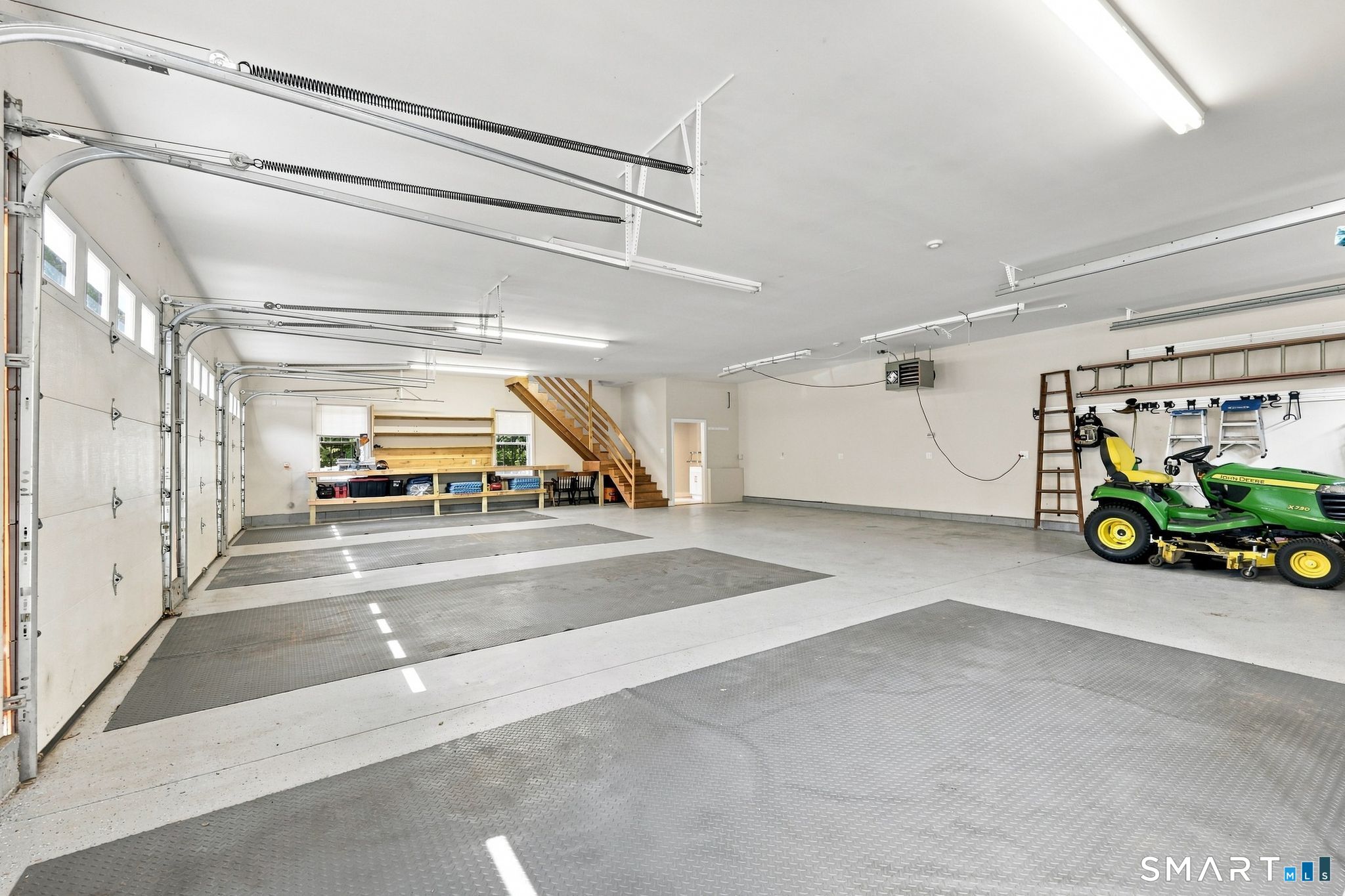 467 Somers Road Ellington, CT 06029 - Photo 29 of 37 Detached 5 bay heated garage with expoxy floors & finished bonus space on second level