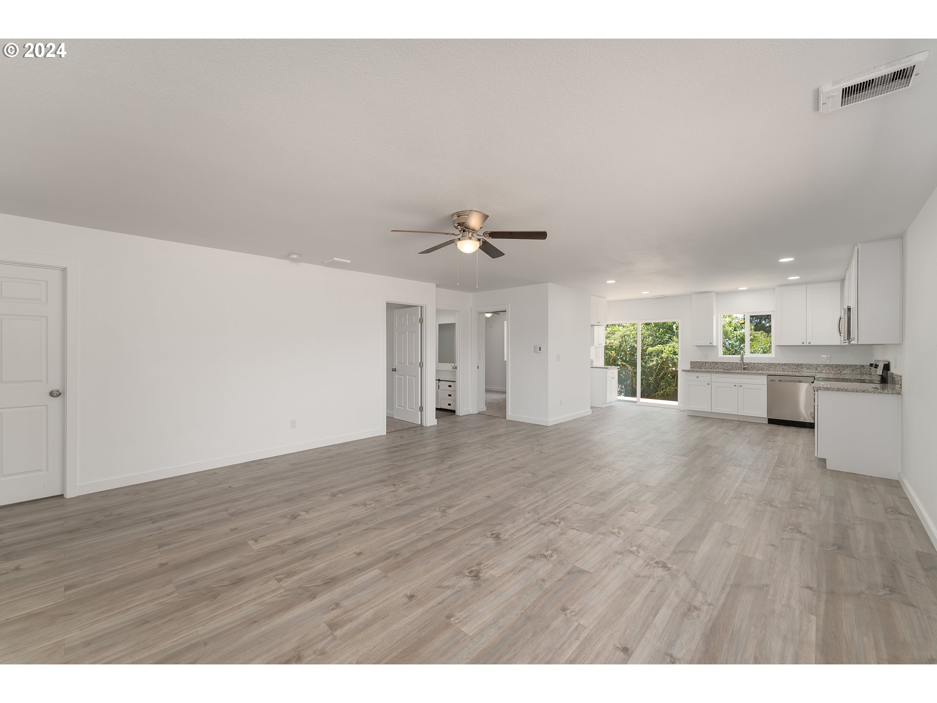 1237 Southeast Washington Avenue Roseburg, OR 97470 - Photo 12 of 28 a view of an empty room with a kitchen